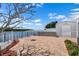 Brick patio with water views, a shed, and white fencing at 109 Carmelina St, Ruskin, FL 33570