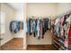 Spacious walk-in closet with ample shelving and hanging space for organization at 11109 Great Neck Rd, Riverview, FL 33578