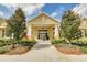 Clubhouse exterior showcasing a welcoming entrance with well-maintained landscaping at 11109 Great Neck Rd, Riverview, FL 33578