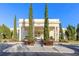 Elegant building with a grand entrance, stately columns, and well-maintained landscaping at 11109 Great Neck Rd, Riverview, FL 33578