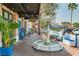 Beautiful street view featuring outdoor dining and a fountain, creating a serene and inviting atmosphere at 11109 Great Neck Rd, Riverview, FL 33578