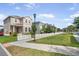 Charming home with a red front door, white picket fence, and a neatly trimmed lawn along the sidewalk at 11109 Great Neck Rd, Riverview, FL 33578