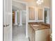 This bathroom shows a granite vanity with a view into a tiled room with columns at 1161 Rio De Janeiro Ave, Punta Gorda, FL 33983