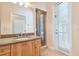 Bathroom showcasing vanity with granite counters and walk-in shower at 1161 Rio De Janeiro Ave, Punta Gorda, FL 33983