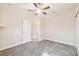 Neutral-toned bedroom with carpet and access to hallway at 1161 Rio De Janeiro Ave, Punta Gorda, FL 33983