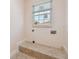 Laundry room area with connections for washer and dryer at 1161 Rio De Janeiro Ave, Punta Gorda, FL 33983