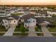 Aerial view of the property showcasing its neighborhood and surrounding houses at 13110 Shumard Way, Riverview, FL 33579