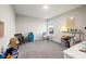 room with plenty of carpeted floor space and natural light from the window at 13110 Shumard Way, Riverview, FL 33579