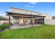 Covered patio with comfortable seating, perfect for outdoor dining and relaxation at 13110 Shumard Way, Riverview, FL 33579