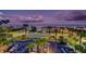 Scenic aerial view of the coastal community, highlighting palm trees and water views at 1350 Gulf Blvd # 502, Clearwater Beach, FL 33767
