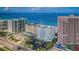 Aerial view of Utopia condos complex and the beach, showcasing its prime beachfront location at 1350 Gulf Blvd # 502, Clearwater Beach, FL 33767