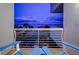 Scenic view from the balcony overlooking the palm trees, landscape, and water at 1350 Gulf Blvd # 502, Clearwater Beach, FL 33767