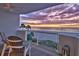 Relax on this beachfront balcony with comfortable seating and stunning sunset views, perfect for enjoying evenings at 1350 Gulf Blvd # 502, Clearwater Beach, FL 33767
