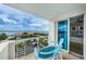 Enjoy beautiful views from the balcony with comfortable seating and serene surroundings at 1350 Gulf Blvd # 502, Clearwater Beach, FL 33767