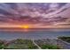 Beautiful beach view overlooking the ocean and colorful sunset for a peaceful experience at 1350 Gulf Blvd # 502, Clearwater Beach, FL 33767