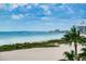 Beautiful Gulf Coast beach with white sand and clear blue skies at 1350 Gulf Blvd # 502, Clearwater Beach, FL 33767
