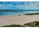 Beautiful beach view with tranquil blue water perfect for swimming, sunbathing and relaxing at 1350 Gulf Blvd # 502, Clearwater Beach, FL 33767