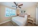 Cozy bedroom with plantation shutters, ocean view, and neutral decor at 1350 Gulf Blvd # 502, Clearwater Beach, FL 33767