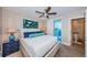 Beautiful bedroom with balcony access and an attached bathroom for convenience at 1350 Gulf Blvd # 502, Clearwater Beach, FL 33767