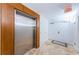 Condo lobby area featuring an elevator, tiled floor, and access to the condos at 1350 Gulf Blvd # 502, Clearwater Beach, FL 33767