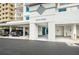Exterior view of a South Tower condo entrance with covered parking and modern architecture at 1350 Gulf Blvd # 502, Clearwater Beach, FL 33767