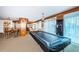 Open community area with a pool table and counter seating at 1350 Gulf Blvd # 502, Clearwater Beach, FL 33767