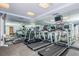Well-equipped gym with treadmills, weights, and mirrors, perfect for a complete fitness routine at 1350 Gulf Blvd # 502, Clearwater Beach, FL 33767