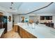 Spacious kitchen with long countertops, modern appliances, and eat-in bar at 1350 Gulf Blvd # 502, Clearwater Beach, FL 33767