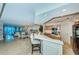Spacious eat-in kitchen with light countertops, stainless steel appliances, and luxury tile flooring at 1350 Gulf Blvd # 502, Clearwater Beach, FL 33767