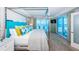 Bright main bedroom with ocean views, balcony access, and modern decor at 1350 Gulf Blvd # 502, Clearwater Beach, FL 33767