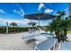 Beautiful patio with lounge chairs, spa, and ocean views at 1350 Gulf Blvd # 502, Clearwater Beach, FL 33767