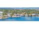 Waterfront homes with private docks line the bay, offering stunning views and deep-water access at 1508 Eden Isle Ne Blvd, St Petersburg, FL 33704