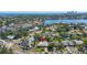 Stunning aerial view of neighborhood showcasing waterfront access and serene residential streets at 1508 Eden Isle Ne Blvd, St Petersburg, FL 33704