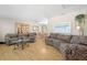 Bright living room features hardwood floors and decorative furniture, perfect for relaxation at 1508 Eden Isle Ne Blvd, St Petersburg, FL 33704