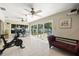 Bright exercise room with pool access and a view, perfect for fitness and relaxation at 1508 Eden Isle Ne Blvd, St Petersburg, FL 33704