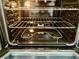 View of the interior of the oven with the racks at 1655 S Highland Ave # I286, Clearwater, FL 33756