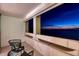 Relaxing balcony with seating area and a beautiful ocean view at night at 17920 Gulf Blvd # 2004, Redington Shores, FL 33708