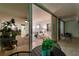 Open living room with a sliding door to the balcony and ocean views at 17920 Gulf Blvd # 2004, Redington Shores, FL 33708