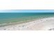 Aerial view of a sandy beach and the clear turquoise ocean at 17920 Gulf Blvd # 2004, Redington Shores, FL 33708