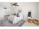 Bright bedroom with a ceiling fan, beach-themed decor, and an area rug adding a cozy touch at 17920 Gulf Blvd # 2004, Redington Shores, FL 33708