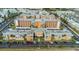 Aerial view showcasing this beautiful condo community with lush landscaping and ample parking at 1900 68Th N St # 110, St Petersburg, FL 33710