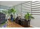 Bright living room featuring large windows and plants at 1900 68Th N St # 110, St Petersburg, FL 33710