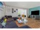 The beautifully designed living room features a large sectional couch, providing ample seating and comfort at 1900 68Th N St # 110, St Petersburg, FL 33710
