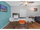 Bright, open living area with a modern desk space and comfortable seating at 1900 68Th N St # 110, St Petersburg, FL 33710