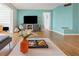 This cozy living room features a modern white coffee table, perfect for hosting gatherings or quiet evenings at 1900 68Th N St # 110, St Petersburg, FL 33710