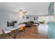 Spacious living room featuring modern furnishings and lots of natural light at 1900 68Th N St # 110, St Petersburg, FL 33710