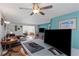 Open living area showcasing a ceiling fan and modern decor at 1900 68Th N St # 110, St Petersburg, FL 33710
