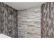 Shower features patterned wall tiles and a modern shower head at 1900 68Th N St # 110, St Petersburg, FL 33710