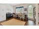 Spacious home office with wood floors, natural light, and a built-in workspace at 2159 Warwick Dr, Oldsmar, FL 34677