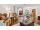 Open-concept living area with hardwood floors and a view of the front entrance at 2159 Warwick Dr, Oldsmar, FL 34677